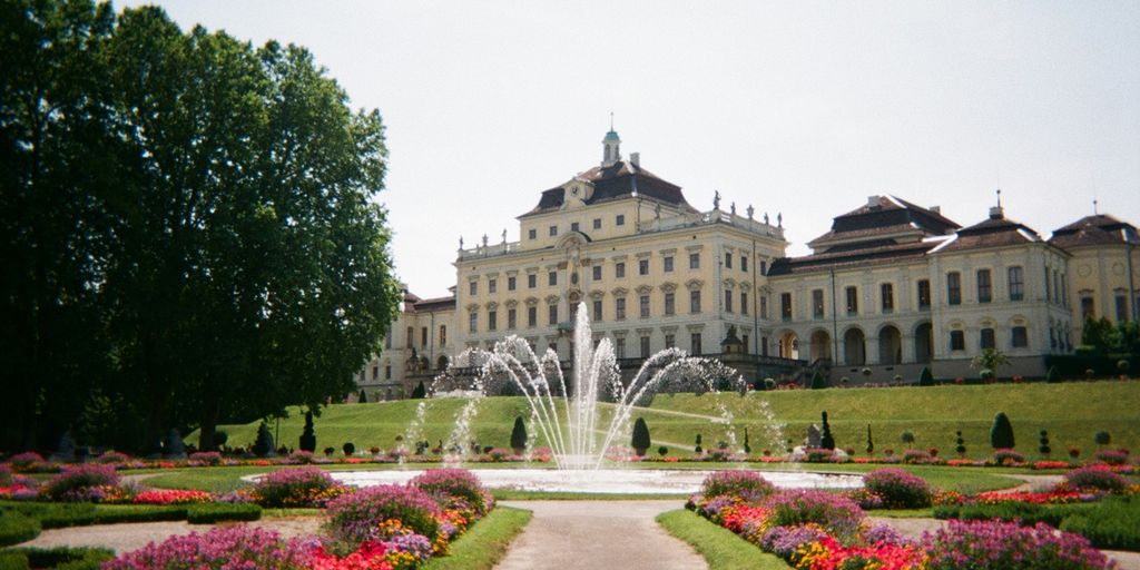 Ludwigsburg Palace near green field and park during daytime